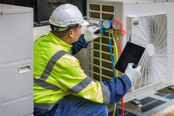 Professional Air Conditioning Repair technician working in Fort Bliss, TX